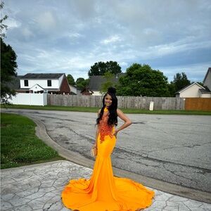 Orange turtle neck prom dress